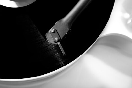 Record Player Tonearm on Vinyl Record