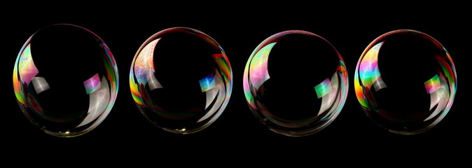 Set soap bubble isolated on black in flight texture and background with clipping path