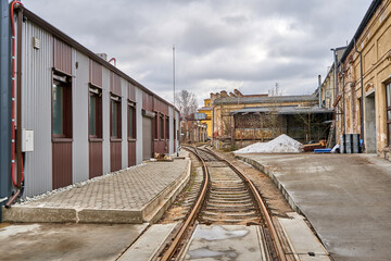 Fototapeta na wymiar Railway tracks in the factory yard. 