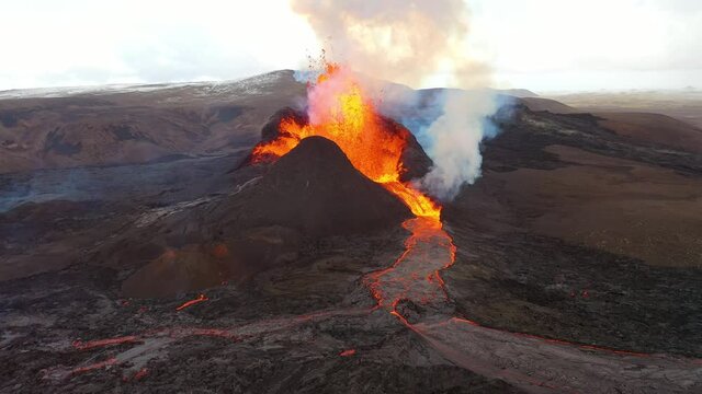 Amazing drone aerial of the dramatic volcanic eruption of the Fagradalsfjall volcano on the Reykjanes Peninsula in Iceland.