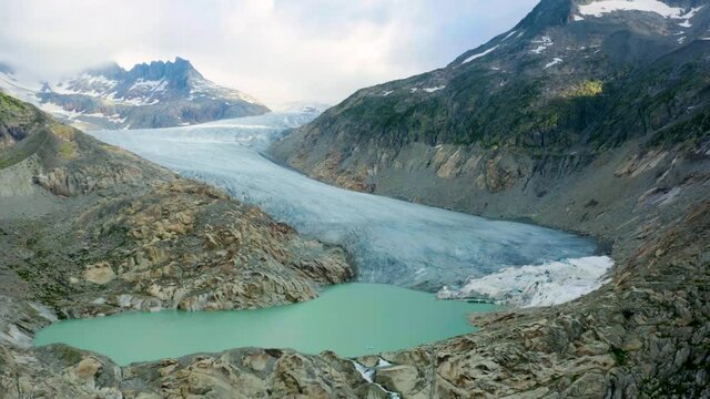 Switzerland, canton of Valais. Aerial view of the Rhone Glacier (Rhonegletscher) on a cloudy day 