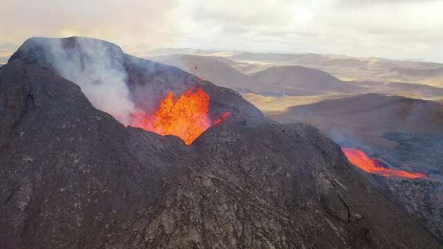 Incredible aerial of the dramatic volcanic eruption of the Fagradalsfjall volcano on the Reykjanes Peninsula in Iceland.