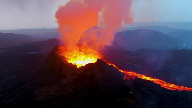 Amazing night drone aerial of the dramatic volcanic eruption of the Fagradalsfjall volcano on the Reykjanes Peninsula in Iceland.