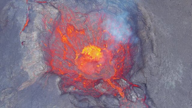High drone birds eye view aerial of the Fagradalsfjall volcano volcanic explosive eruption on the Reykjanes Peninsula in Iceland.
