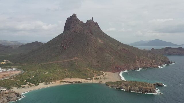 Aerial panoramic view of San Carlos bay in Sonora, Mexico. Cerro Tetakawi as background with the drone slowly ascending.