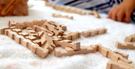 wooden educational logic toys in the children's room selective focus.