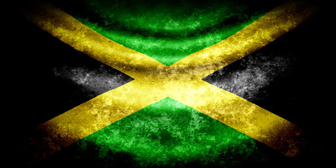 Jamaica wavy flag in grunge style with darkened edges. Aged texture