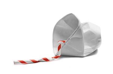 Disposable crumpled, paper cup and drinking straw for throwing away and recycling isolated on white background with clipping path