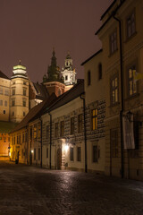 Fototapeta na wymiar Cracow by night - Wawel castle and Kanonicza street
