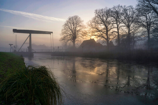 Bridge over a frozen canal