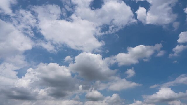 blue sky wide space in day time. airy clouds disappeared leaving half moon traveling in beautiful clear soft ocean-blue sky. day time in good environment, sunny good weather forecast. B roll footage