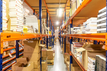 La Coruna, Spain. 10-09-2019. Full shelves of a warehouse due to the beginning of the school year. Waiting for school supplies. Back to school concept