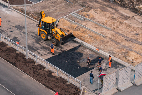 builders work on road construction