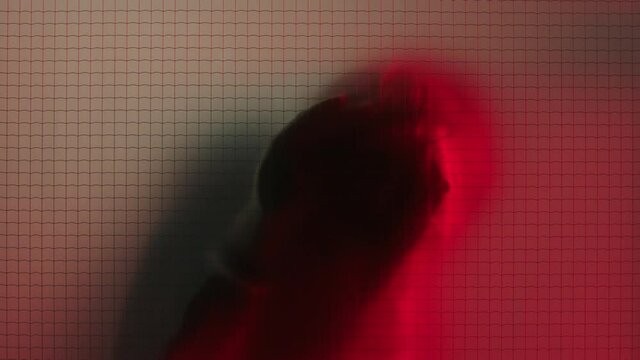 trapped man knocking on window calling for help victim trying to escape with red light