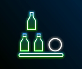 Glowing neon line Bottles ball icon isolated on black background. Colorful outline concept. Vector