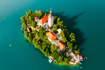 Panoramic view of Lake Bled with Assumption of Maria Church on island on the background of Julian...