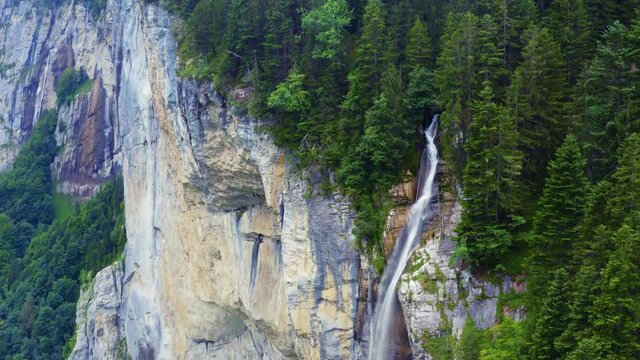 Switzerland, aerial view of Staubbach Waterfall - famous waterfall in Lauterbrunnen - a village and a municipality in the Interlaken-Oberhasli administrative district in the canton of Bern