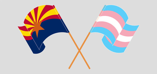 Crossed and waving flags of the State of Arizona and Transgender Pride