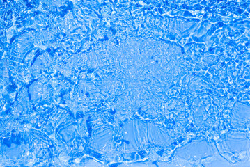 Fototapeta na wymiar Serum texture close up. Clear blue liquid gel background. Transparent beauty skincare product sample. Cosmetic clear liquid cream smudge. Transparent skin care product sample banner.