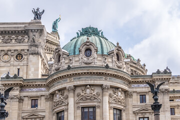 Fototapeta na wymiar Fragment of Neo-baroque building of Grand Opera in Paris (Garnier Palace). Paris, France.
