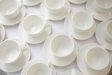 Empty tea white cups on the table.