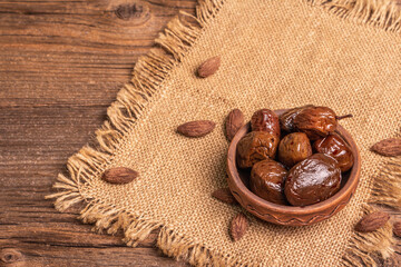 Sun-dried olives in a ceramic bowl