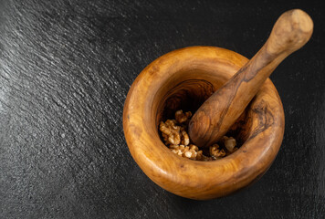 Olive wood mortar with pestle for crushing nuts	