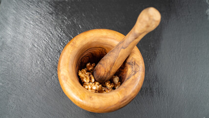 Olive wood mortar with pestle for crushing nuts	