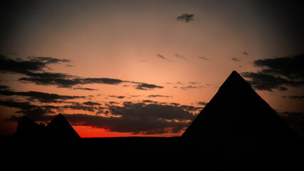 sunset on the three pyramids of egypt