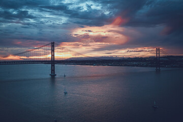 incredible sunset over the big bridge. river and bridge
