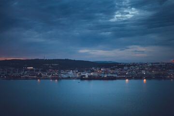 Obraz premium night city over the river