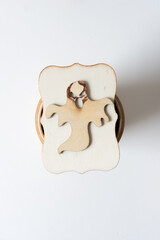 phantasm on a wooden shape on white