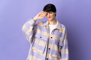Fototapeta premium Woman with short hair isolated on purple background with tired and sick expression