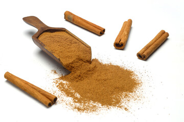 Wood scoop with cinnamon powder and cinnamon sticks isolated on white background