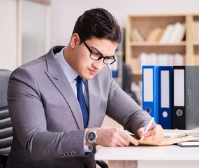 Businessman receiving letter in the office