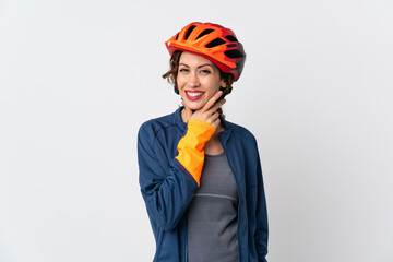 Young cyclist woman isolated on white background happy and smiling