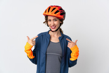 Young cyclist woman isolated on white background giving a thumbs up gesture