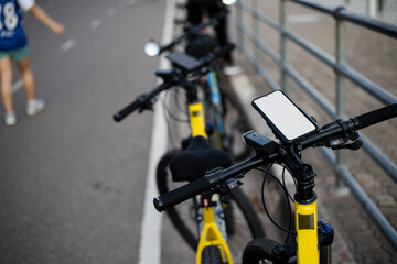 smart phone Showing white screen on bicycle. smartphone installed at bicycle handle bar for navigator. copy space for text.