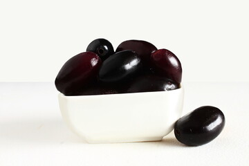 fresh jambolan plum, jamun,java plum,black jamun,syzygium cumini or jambhul fruit in white background