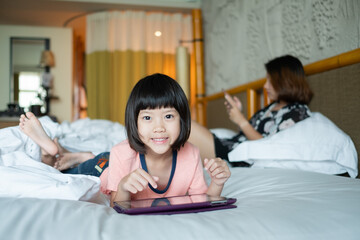 chinese child addicted phone, asian girl playing smartphone, kid watching cartoon