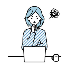デスクで座ってPCを開いて困っているリモートワークの女性