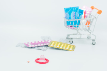 condom with contraceptive, birth control pill, safe sex
