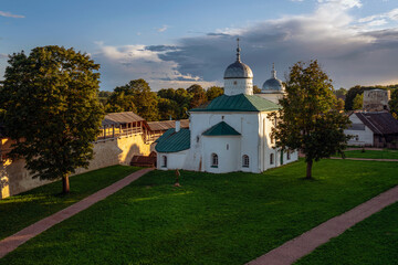 Fototapeta na wymiar View of the St. Nicholas (Nikolsky) Cathedral on the territory of the Izborsk fortress (XIV-XVII centuries) on a sunny summer evening. Stary Izborsk, Pskov region, Russia