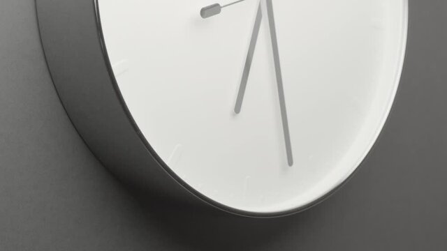 From 6 to 7 Clock Face on Grey Wall