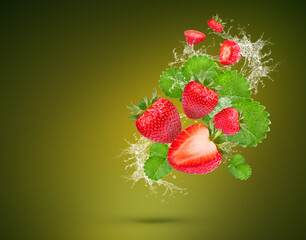 Water Splash On fresh strawberries with leaves Isolated on green background