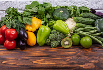 Variety of raw vegetables. Fresh vegetables and fruits background. A set of delicious vegetables. Assortment of fresh organic fruits and vegetables. Composition with organic food. Healthy food.