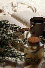 cup of coffee with a book and flowers enjoying free time 