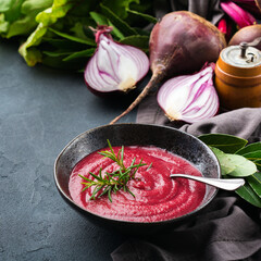 Seasonal fall autumn creamy beetroot soup on a table
