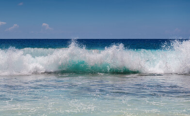 Ocean wave with white foam