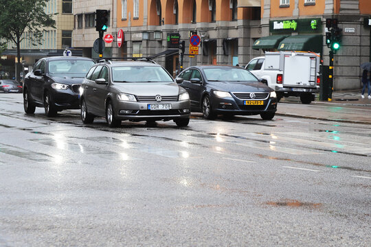 Stockholm, Sweden - August 16, 2021:Traffik in downtown Stockholm on the Sveavagen street during a rainy day.